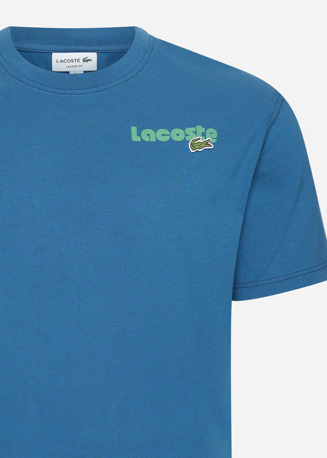 Lacoste T-shirts Lacoste backprint tee - globe