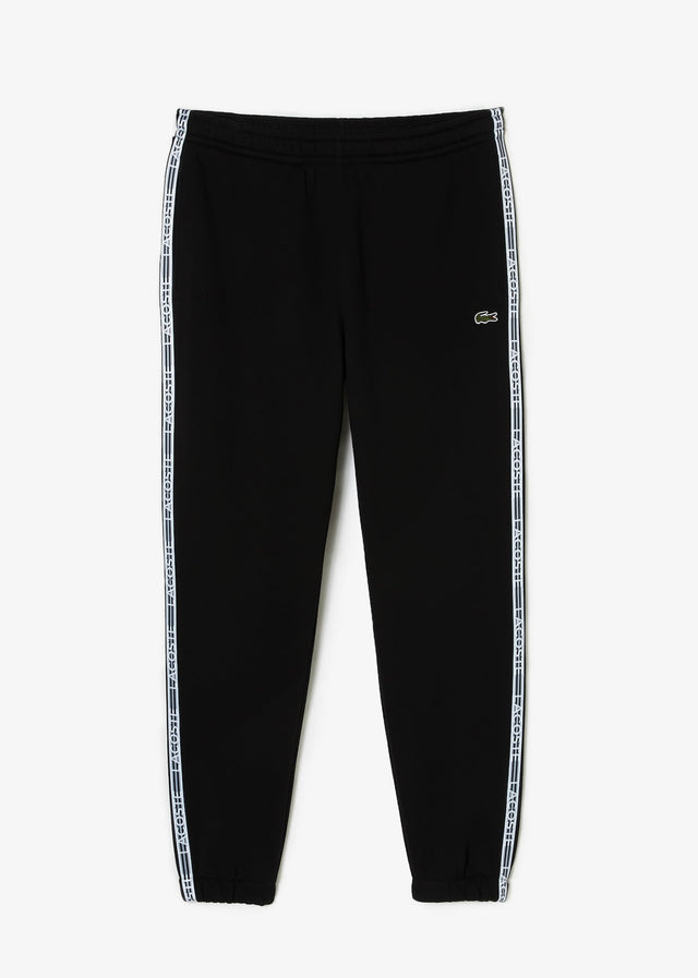 Lacoste Pants  Contrast stripe tracksuit trousers - black 